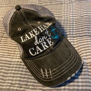 Distressed “Lake Hair Don’t Care” trucker hat